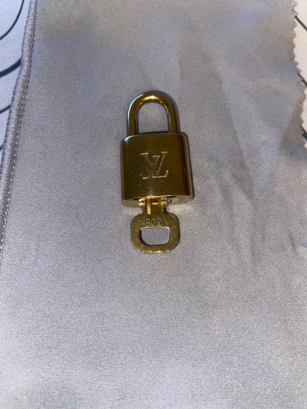 Louis Vuitton Gold-Tone Signature Padlock with Key